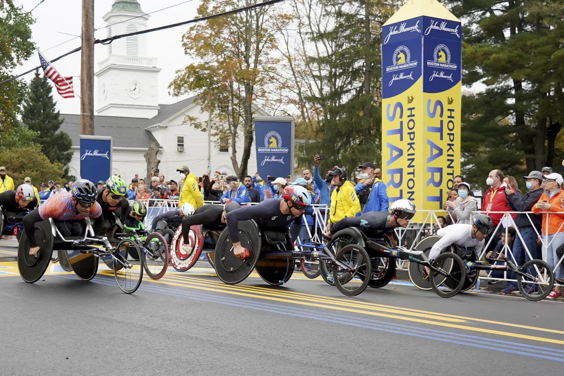 Participants in the men's wheelchair division break from the starting line of the 125th Boston Marathon. (Mary Schwalm/AP)