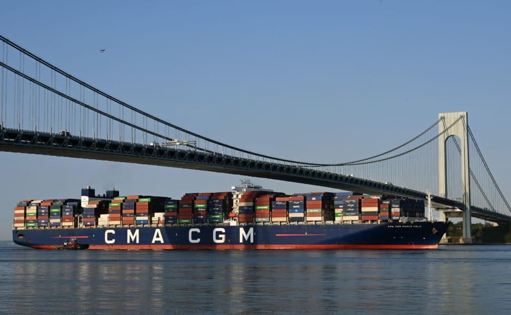 The CMA CGM Marco Polo,an ultra-large container vessel with a maximum capacity of 16,022 twenty-foot equivalent units, passes under the Verrazzano-Narrows Bridge. (TIMOTHY A. CLARY/AFP via Getty Images)