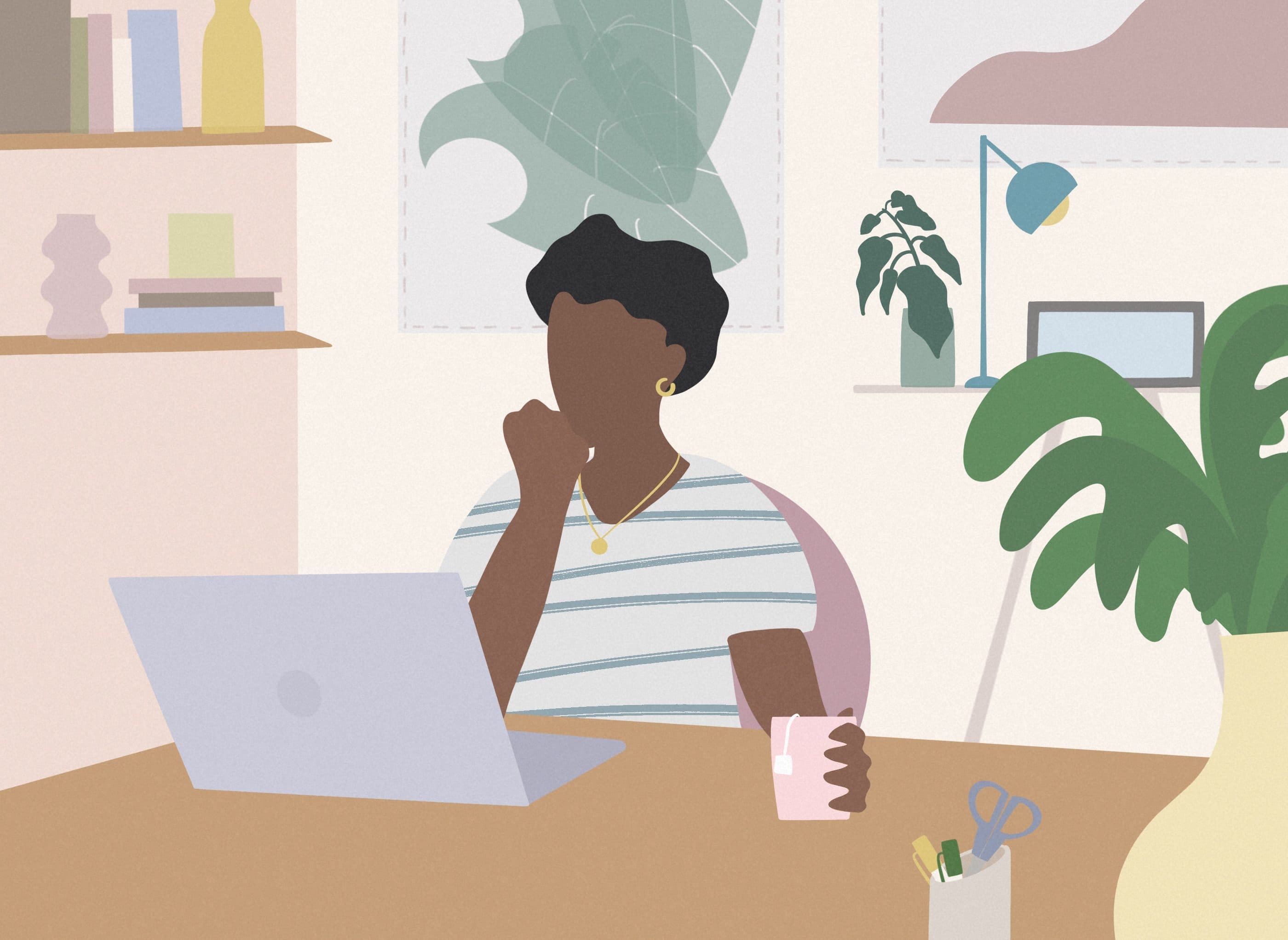 A woman works at home on the computer. (Getty Images)