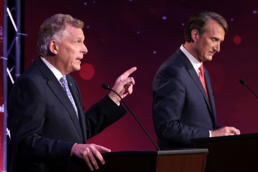 Former Virginia Gov. Terry McAuliffe (L) and gubernatorial candidate Glenn Youngkin. (Win McNamee/Getty Images)