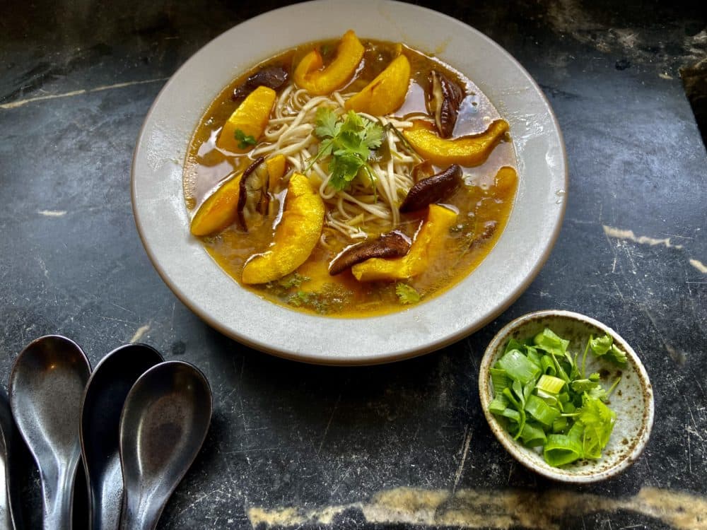 Roasted pumpkin and mushrooms in ginger-miso broth with scallions and cilantro. (Kathy Gunst)