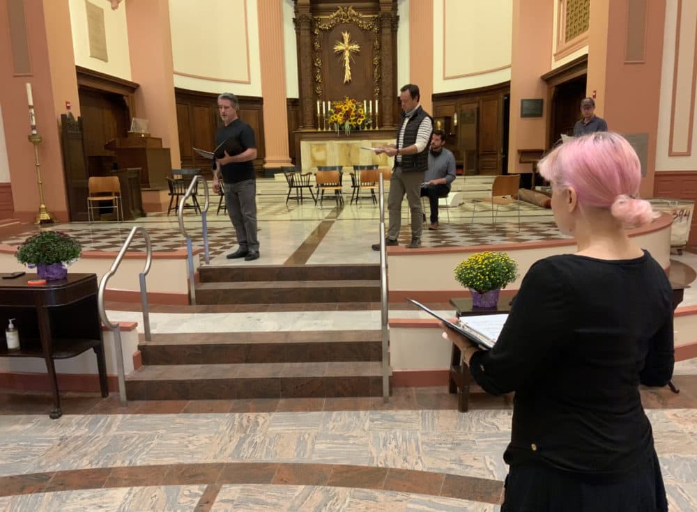 Kirsten Cairns, foreground, watches as Matthew DiBattista sings in a rehearsal for 