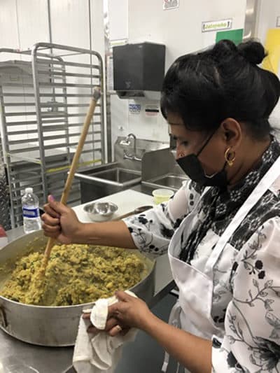 Chef Shanthini making samosas. (Karyn Miller-Medzon/Here &amp; Now)