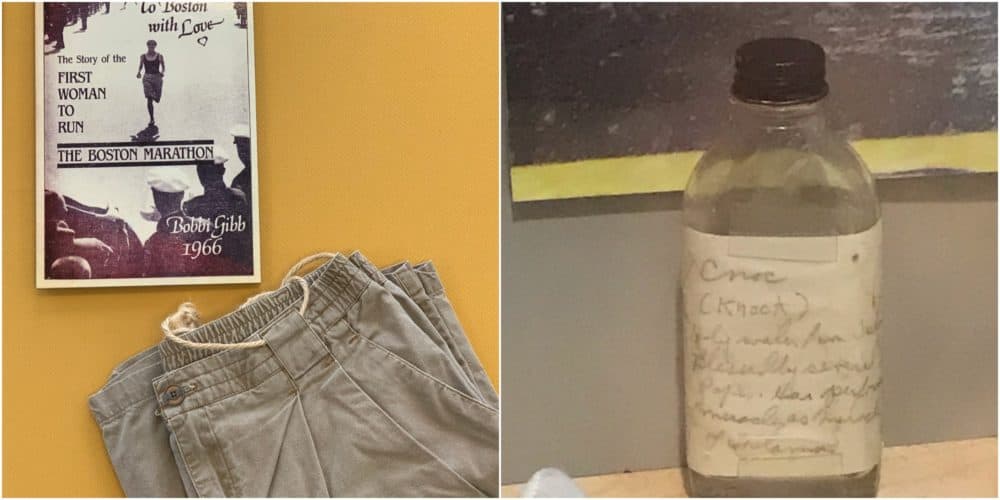 Pictured on the left, the Bermuda shorts Bobbi Gibb wore when she ran the Boston Marathon in 1966. And on the right, the holy water Joan Benoit Samuelson ran with during her 1979 Boston Marathon victory. (Courtesy Boston Athletic Association)