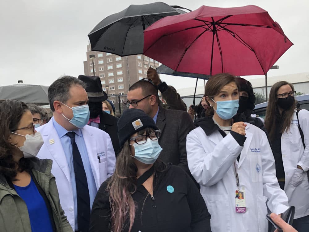 Doctors, politicians and advocates stood outside of the Suffolk County Jail Wednesday to oppose plans to build a makeshift courtroom and addiction treatment center inside the facility. (Deb Becker/WBUR)