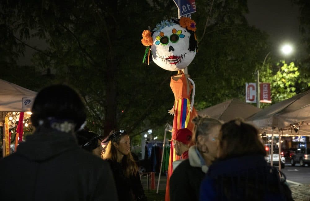 A cartoneria Catrina stands at the center of the Día de los Muertos festival. Veronica Robles created the sculpture in memory of her daughter Kithzia. (Robin Lubbock/WBUR)