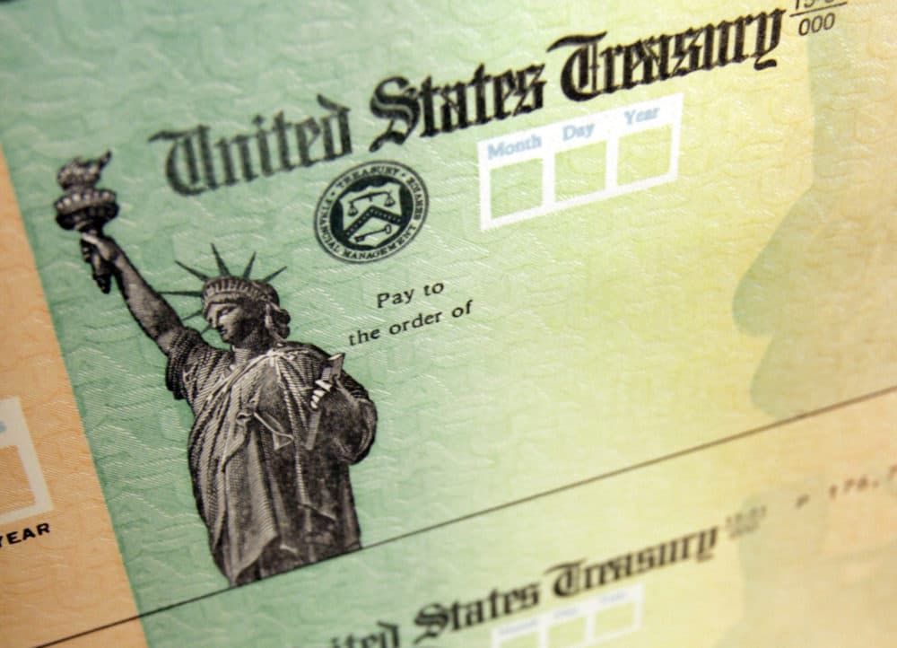 Blank checks on an idle press at the Philadelphia Regional Financial Center. (AP Photo/Matt Rourke, File)