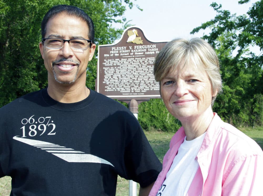 Keith Plessy and Phoebe Ferguson, descendants of the principals in the Plessy V. Ferguson court case, pose for a photograph in front of a historical marker in New Orleans, on Tuesday, June 7, 2011. Homer Plessy, the namesake of the U.S. Supreme Court’s 1896 “separate but equal” ruling, is being considered for a posthumous pardon. The Creole man of color died with a conviction still on his record for refusing to leave a whites-only train car in New Orleans in 1892. (Bill Haber/AP)