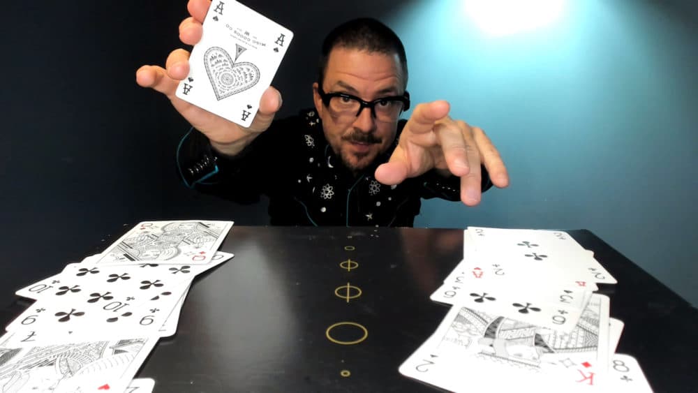 Thaddeus Phillips performs card tricks in &quot;Zoo Motel,&quot; a digital show via ArtsEmerson. (Courtesy Rafael Esteban Phillips Mannarino)