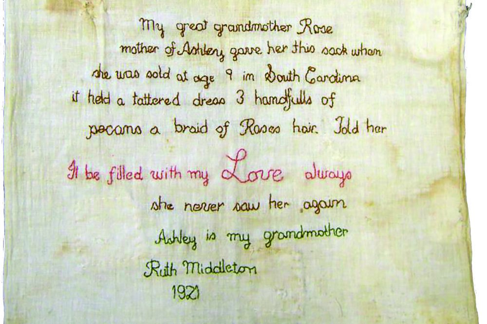 The sack reads: My great grandmother Rose, mother of Ashley, gave her this sack when she was sold at age 9 in South Carolina. It held a tattered dress, 3 handfuls of pecans, a braid of Rose’s hair. Told her, It be filled with my Love always. She never saw her again. Ashley is my grandmother. Ruth Middleton, 1921. (Credit: Middleton Place Foundation)