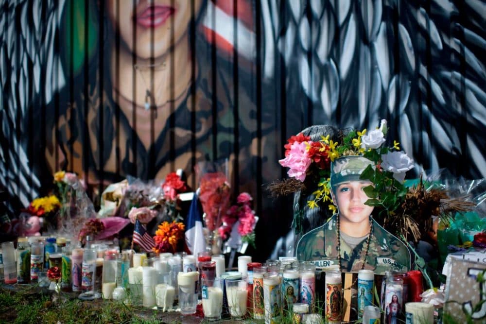 Candles and flowers decorate a makeshift memorial for U.S. Army Specialist Vanessa Guillen at Power House Gym on August 14, 2020, in Houston, Texas. Guillen's murder, and the subsequent suicide of the chief suspect, U.S. Army specialist Aaron Robinson, has put a spotlight on sexual harassment in the U.S. military.(Mark Felix/ AFP via Getty Images)