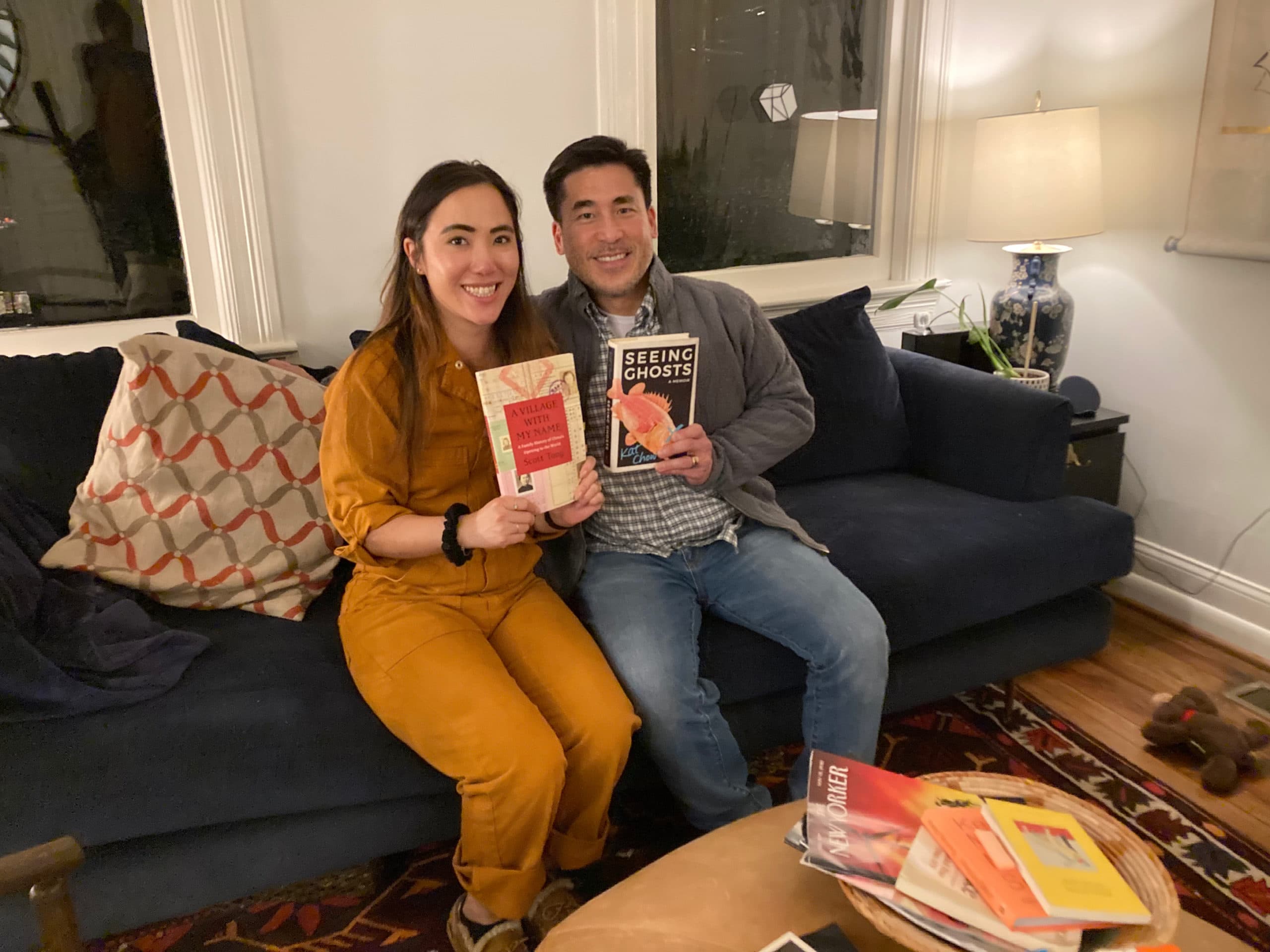 Scott Tong and Kat Chow holding up each other's books. (James Perkins Mastromarino)