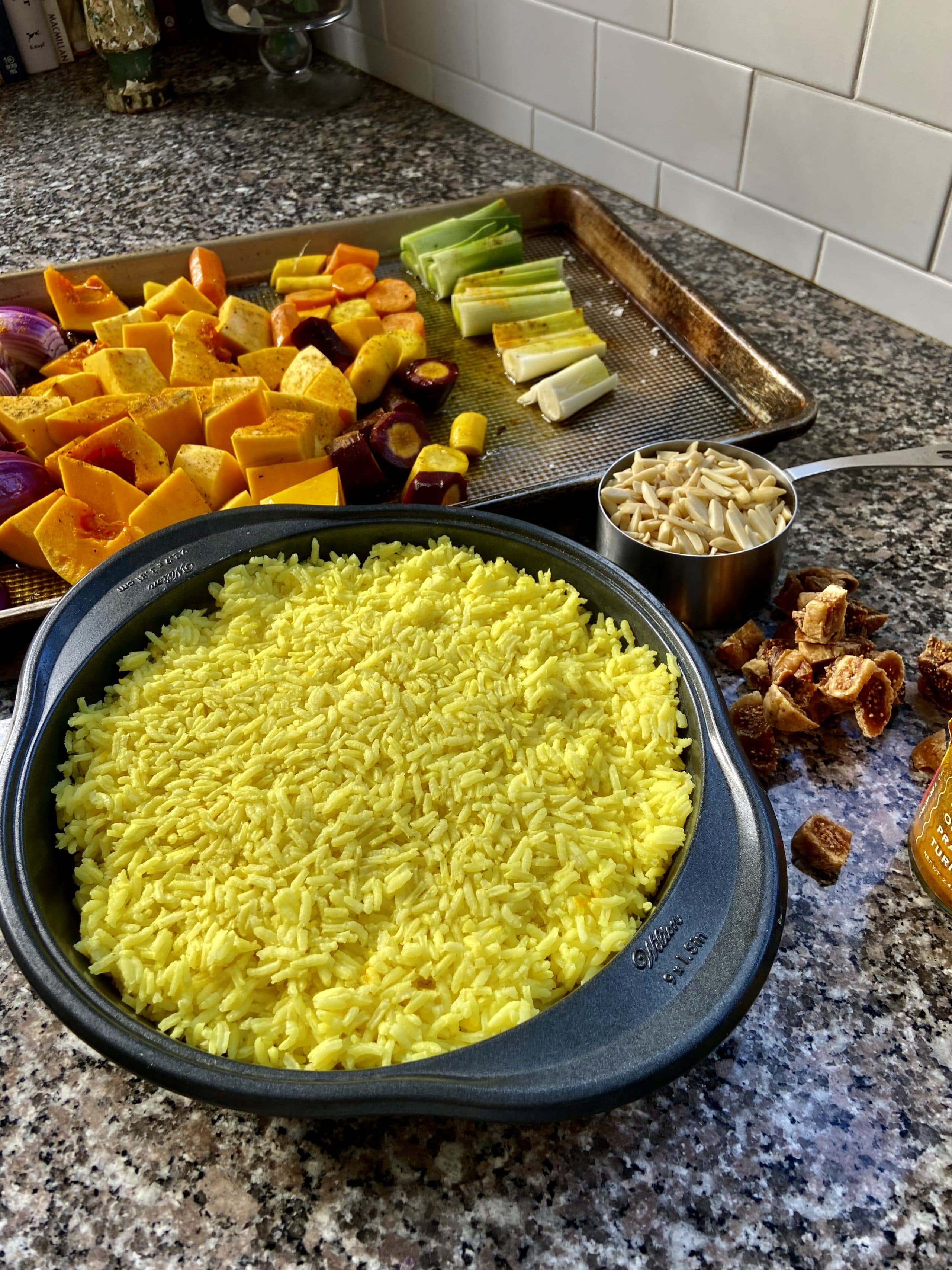 Preparing the vegan jeweled rice with roasted vegetables. (Kathy Gunst/Here &amp; Now)