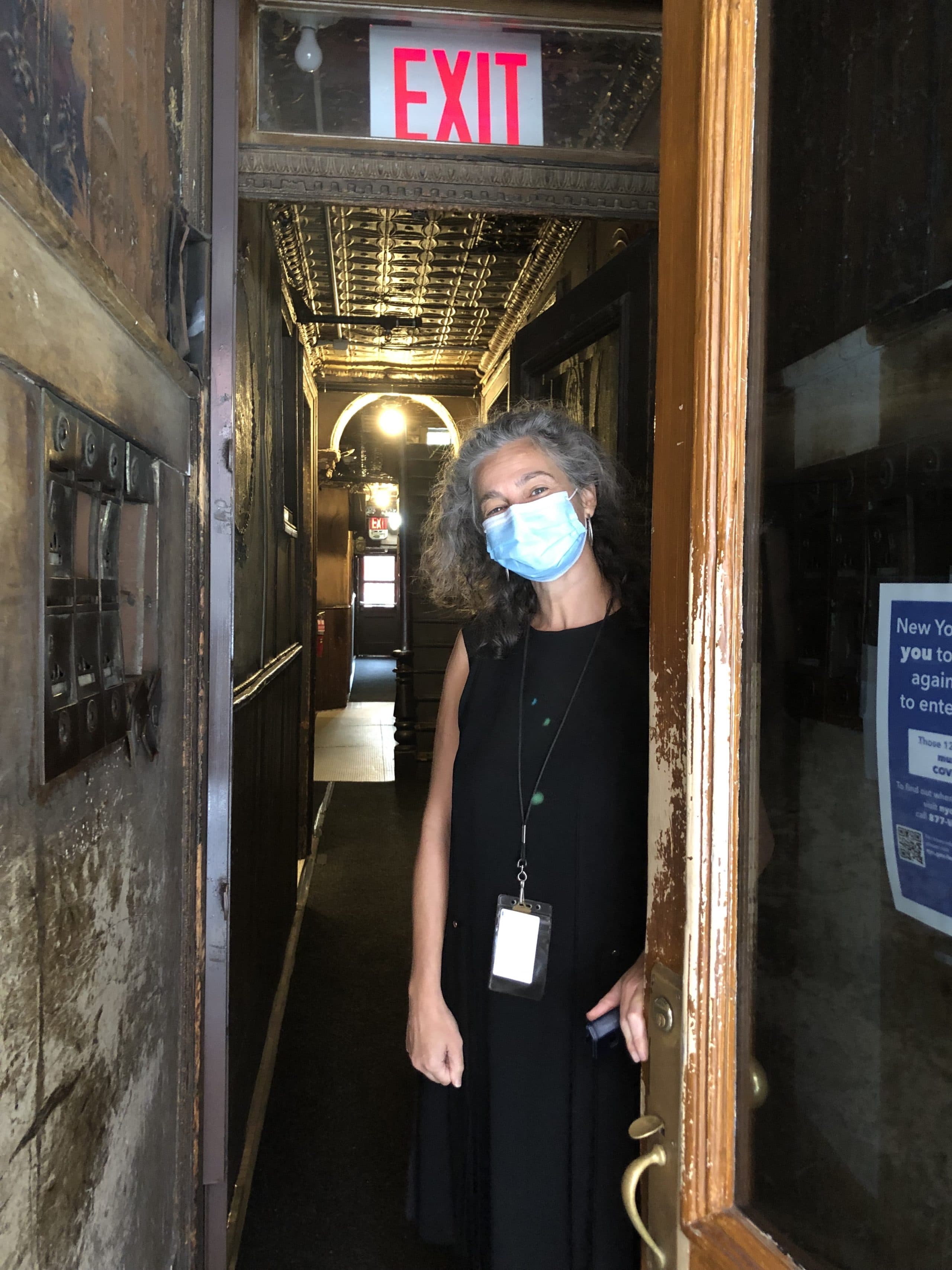 President Annie Polland inside New York's Tenement Museum. (Robin Young/Here & Now)
