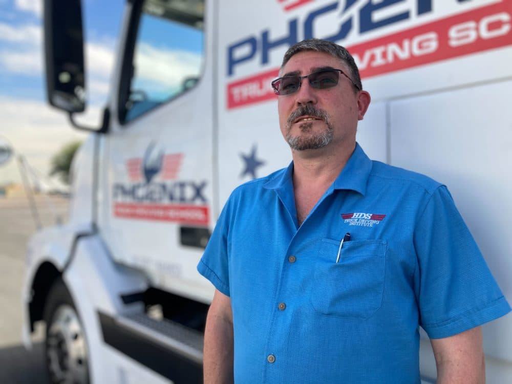 Tim Kernstein, with the Phoenix Truck Driving Institute, says the truck driver shortage is creating a greater demand for workers. As a result, wages are up for new drivers. (Peter O'Dowd/Here & Now)