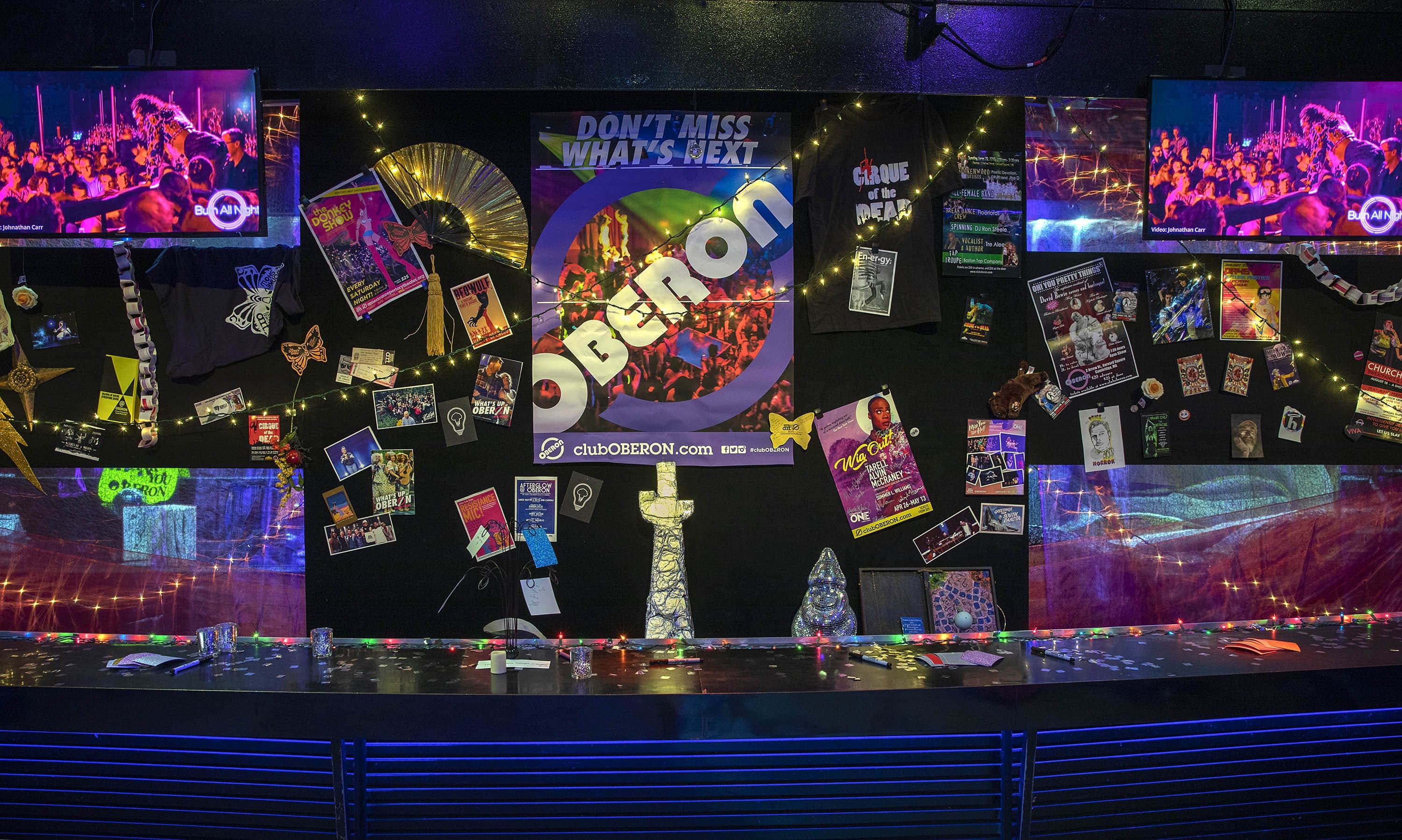 The shrine behind the bar of OBERON, composed of mementos of performances gathered over the years. (Robin Lubbock/WBUR)