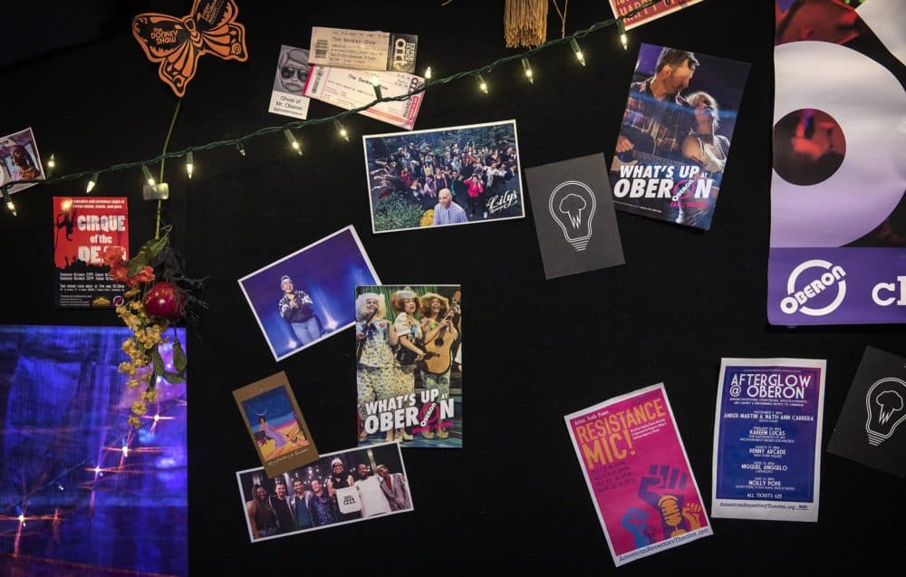 Mementos gathered over years of performances on display at the OBERON bar. (Robin Lubbock/WBUR)