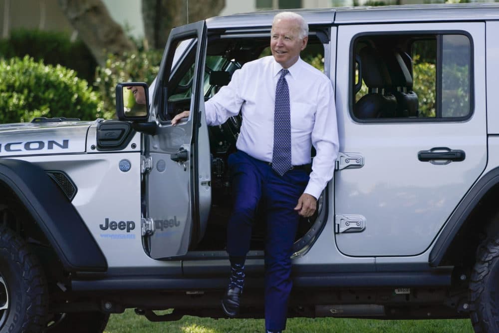 President Biden gets into Jeep Wrangler 4xe Rubicon on the South Lawn of the White House in Washington, on Aug. 5, 2021, during an event on clean cars and trucks. (Susan Walsh/AP)