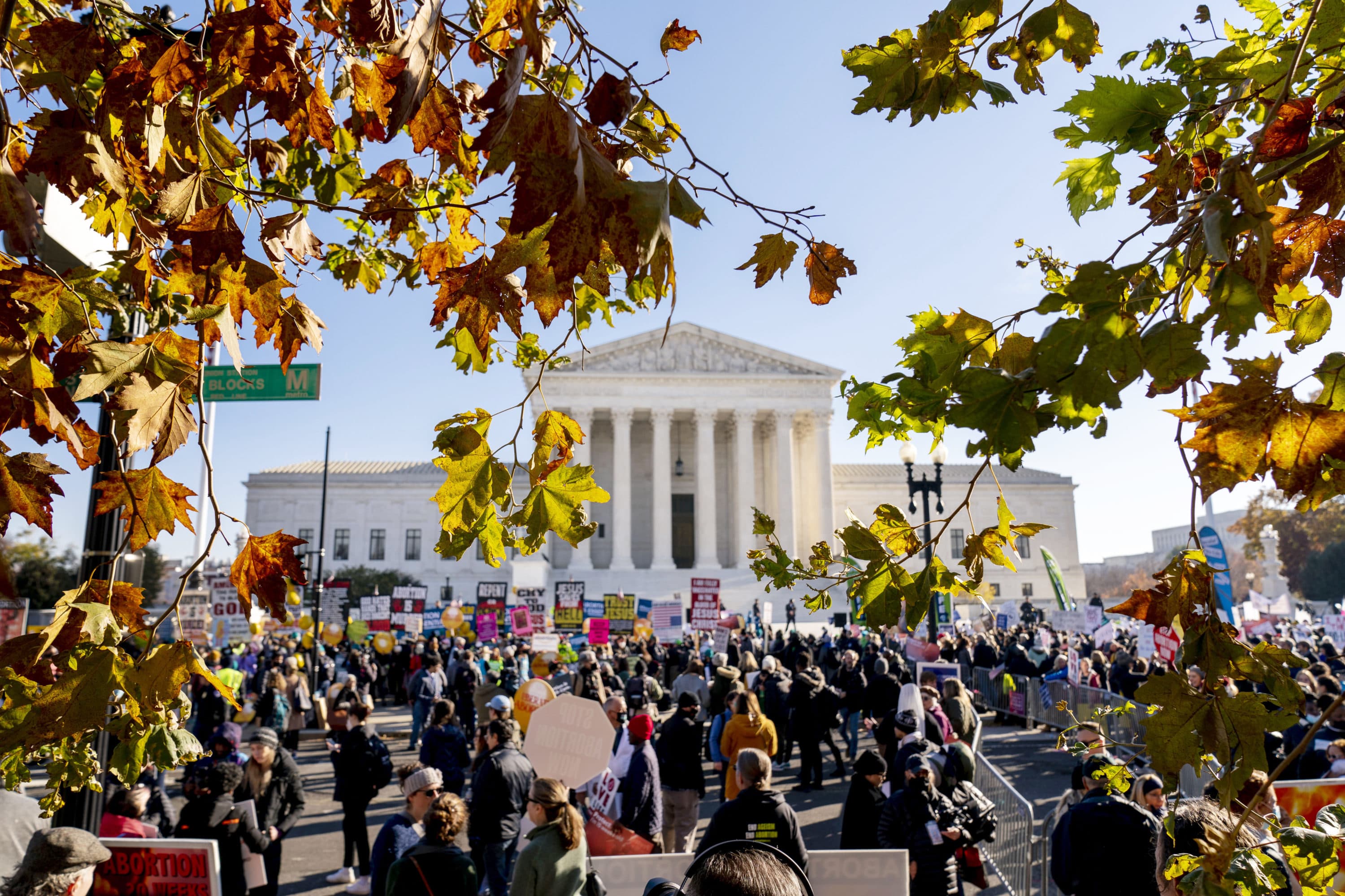 Abortion rights advocates and anti-abortion protesters demonstrate in front of the U.S. Supreme Court on Dec. 1, 2021, as the court hears arguments in a case from Mississippi, where a 2018 law would ban abortions after 15 weeks of pregnancy. (Andrew Harnik/AP)