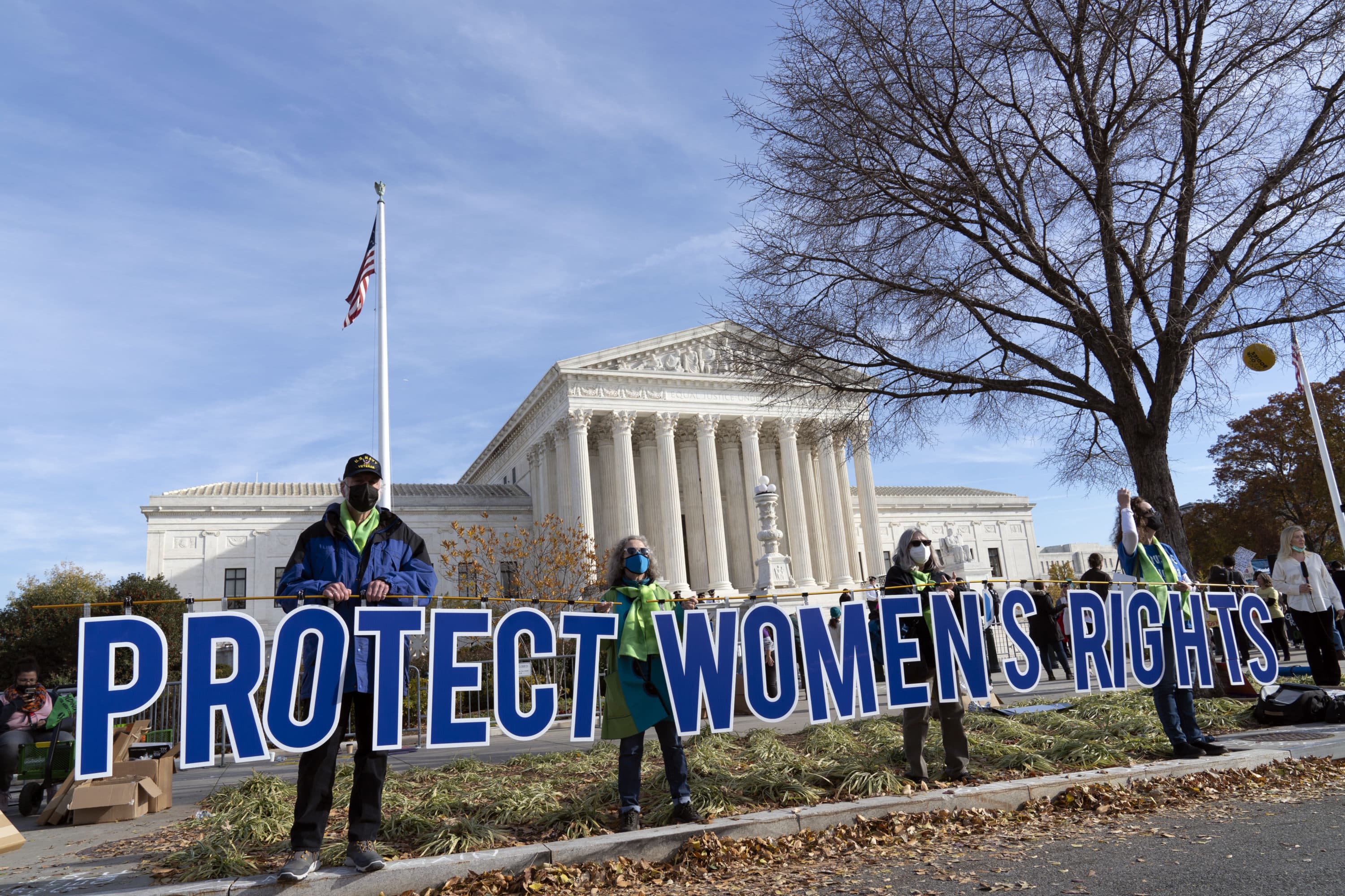 Abortion rights advocates demonstrate in front of the U.S. Supreme Court Wednesday, Dec. 1, 2021, in Washington, as the court hears arguments in a case from Mississippi, where a 2018 law would ban abortions after 15 weeks of pregnancy. (Jose Luis Magana/AP)