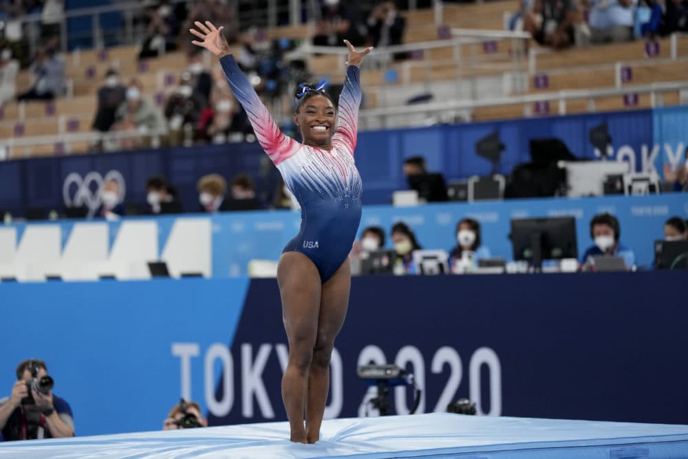 Simone Biles of the United States finishes on the balance beam during the artistic gymnastics women's apparatus final at the 2020 Summer Olympics, on Aug. 3, 2021, in Tokyo, Japan. (Ashley Landis/AP)