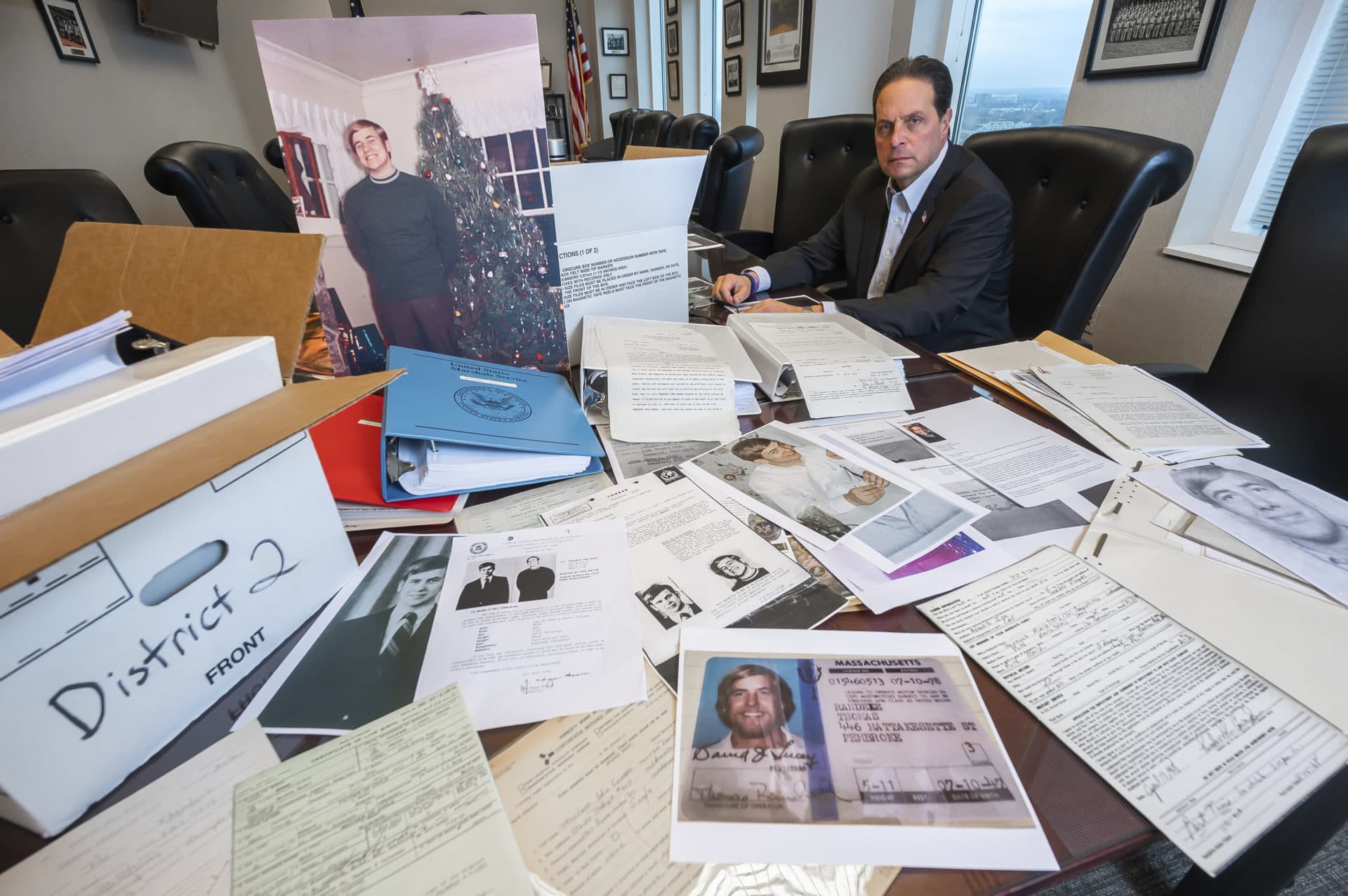 U.S. Marshal Peter J. Elliott at the Carl B. Stokes U.S. Courthouse in Cleveland with items related to a 1969 bank robbery. (Ken Blaze/AP)
