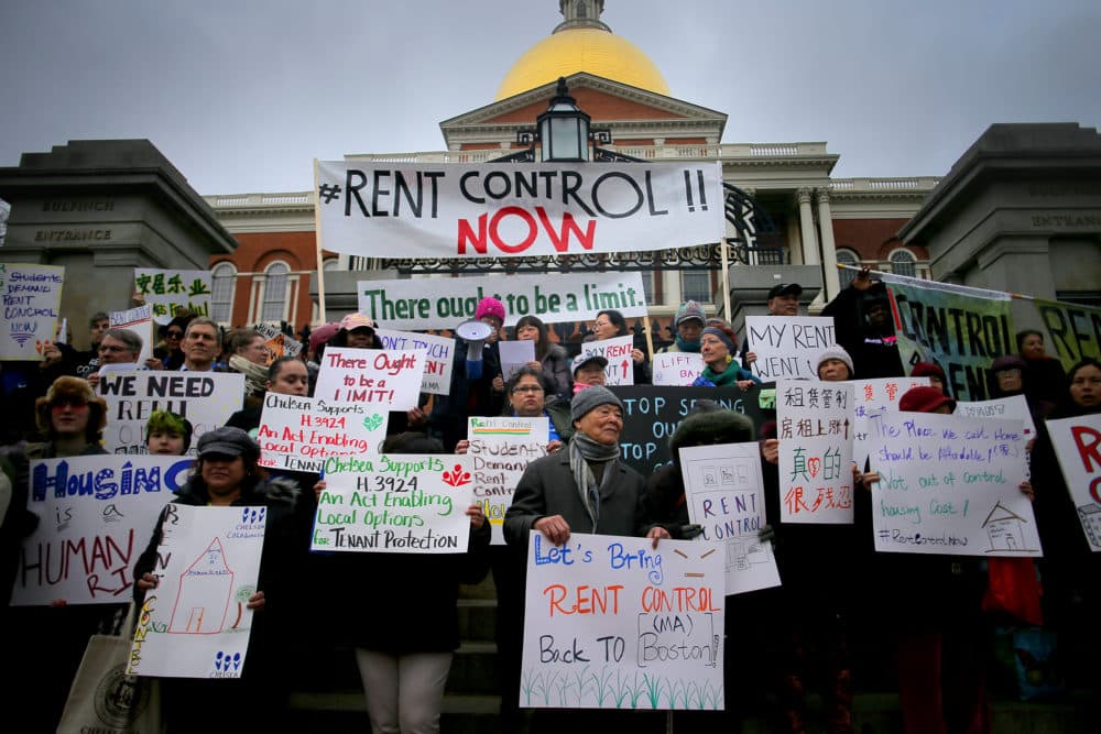 Renters' rights groups rally outside the Massachusetts State House in Boston on Jan. 14, 2020, also flooding the Joint Committee on Housing on Beacon Hill, to call for the return of rent control. (Lane Turner/The Boston Globe via Getty Images)