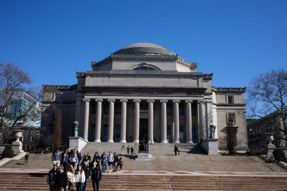 People walk on the Columbia University campus on March 9, 2020, in New York City. (Jeenah Moon/Getty Images)