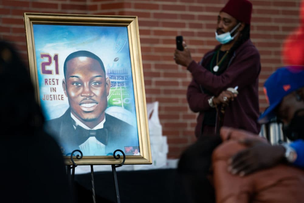 A painting of Ahmaud Arbery is displayed during a vigil at New Springfield Baptist Church on February 23, 2021 in Waynesboro, Georgia. (Sean Rayford/Getty Images)