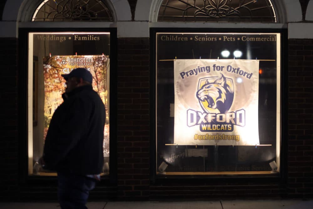 People begin to arrive for a vigil downtown to honor those killed and wounded during the recent shooting at Oxford High School on December 03, 2021 in Oxford, Michigan. (Scott Olson/Getty Images)