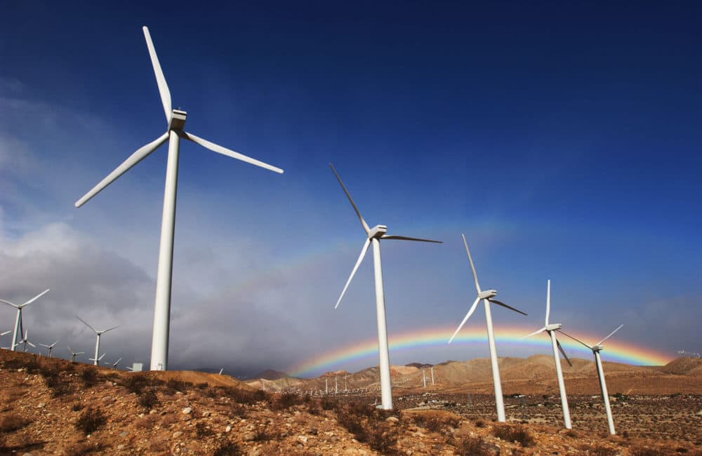 The first storm of the season produces a rainbow behind wind turbines in the San Gorgonio Pass, near Palm Springs, California. (David McNew/Getty Images)