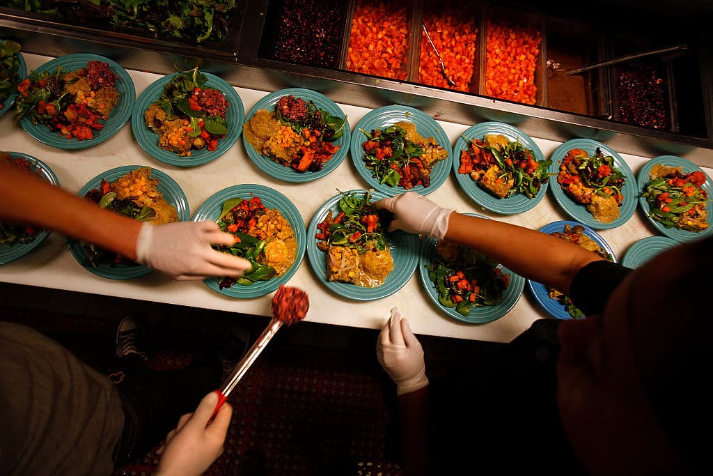 Cafe Gratitude in the Los Angeles neighborhood of Venice serves a free all-vegan ingredient Thanksgiving Day meal for all who care to partake. (Rick Loomis/Los Angeles Times via Getty Images)