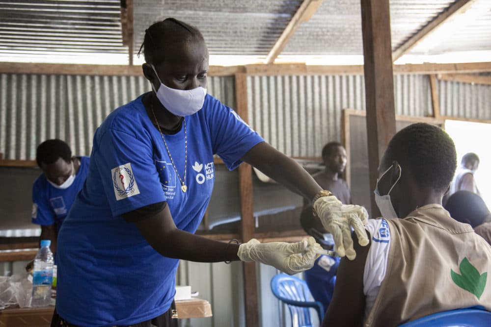 Pictures from Action Against Hunger's COVID-19 vaccination campaign in the Paguir region of South Sudan. (Bebe Joel/Action Against Hunger)