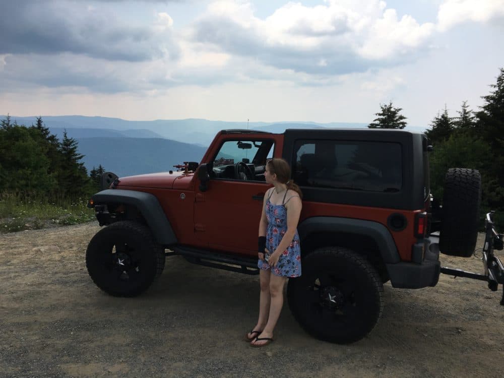 Sparky Anderson's daughter in front of his Jeep during their travels in West Virginia. (Courtesy)