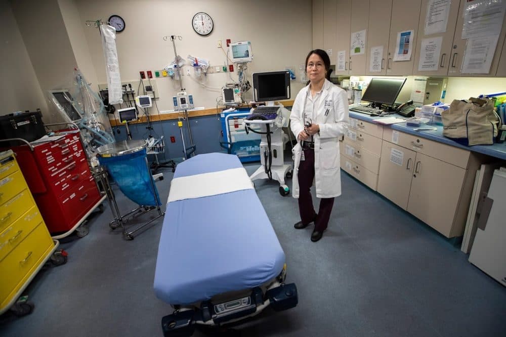 Dr. Melisa Lai-Becker, chief of the emergency department at Cambridge Health Alliance Hospital in Everett, stands in one of the resuscitation rooms in the emergency ward of the hospital. (Jesse Costa/WBUR)