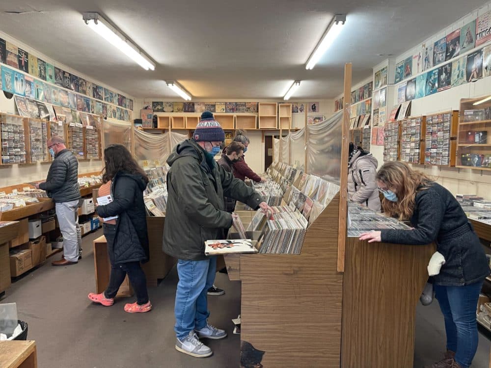 Shoppers sifting through records at Stereo Jack's Records in Cambridge. (Yasmin Amer/WBUR)