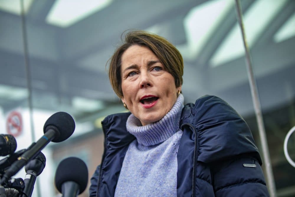 Massaachusetts Attorney General Maura Healey speaks into a microphone at a press conference. Her office launched an investigation into the Danvers school district. The photo was taken by Jesse Costa of WBUR.