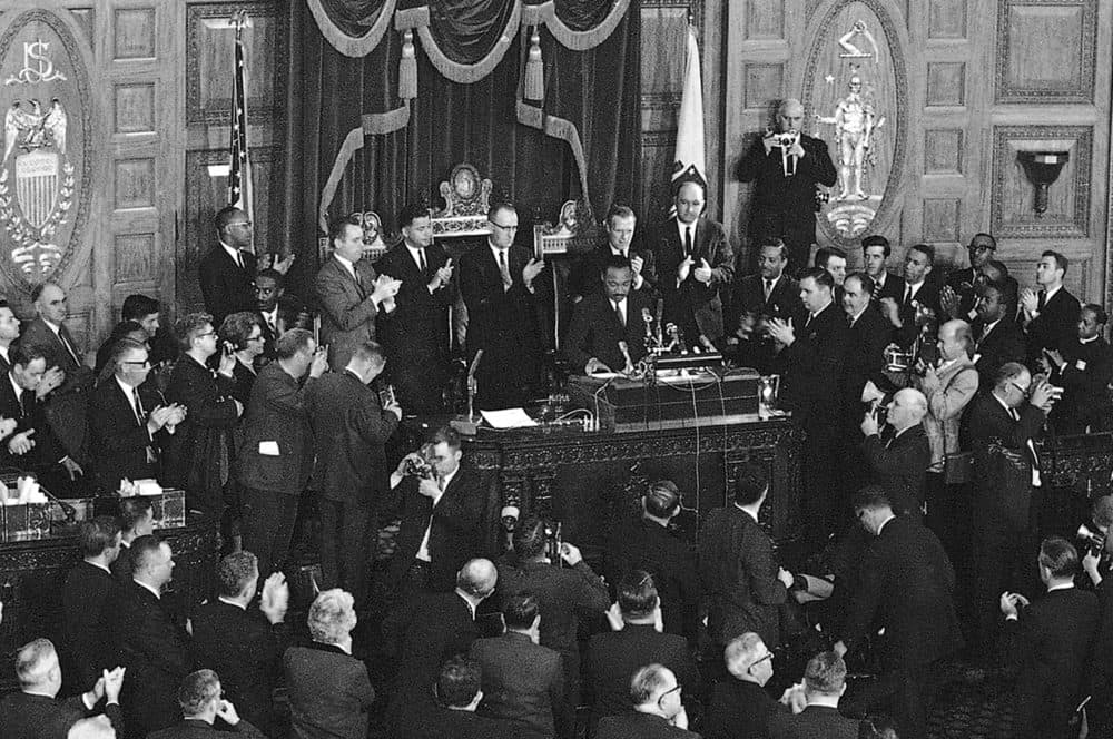 In this April 22, 1965 photo, Dr. Martin Luther King Jr. speaks to the joint session of the Massachusetts Legislature in Boston, the day before he led a civil rights march to Boston Common. (AP)