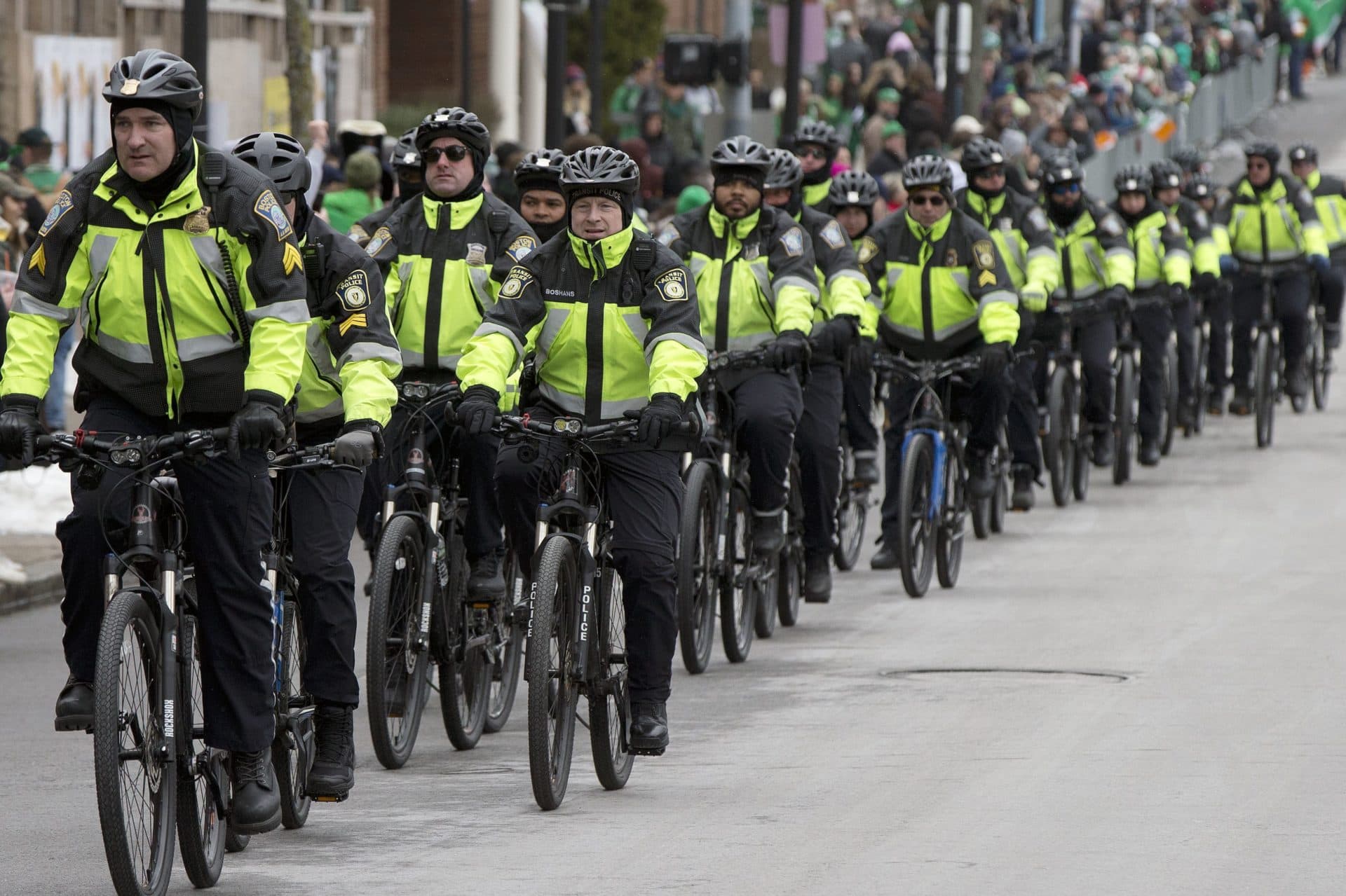 In this March 19, 2017, file photo, Boston Police patrol on bicycles during the annual St. Patrick's Day Parade in Boston. (Michael Dwyer/AP)
