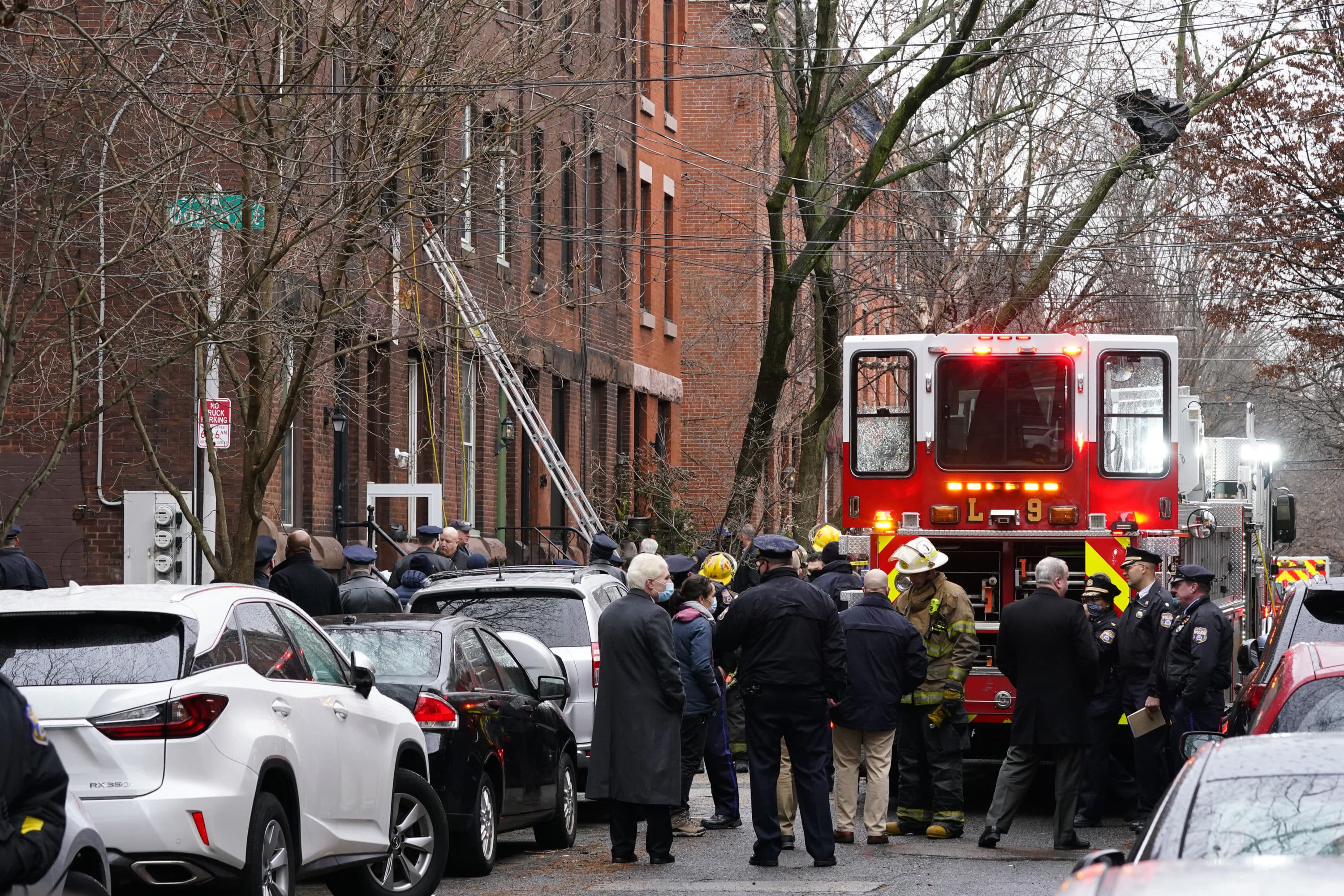 Philadelphia firefighters work at the scene of a deadly row house fire, Wednesday, Jan. 5, 2022, in the Fairmount neighborhood of Philadelphia. (Matt Rourke/AP)