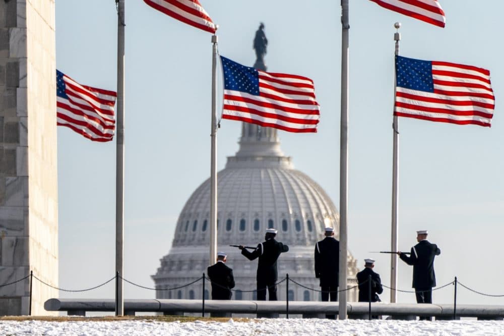 On Thursday, Jan. 6, 2022, a year after the attack on the U.S. Capitol, a U.S. Navy Ceremonial Guard poses with their rifles with the Capitol in the background. (Jacquelyn Martin/AP)