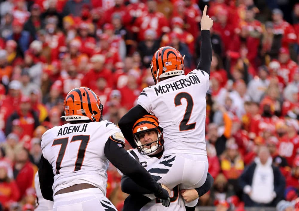 Kicker Evan McPherson #2 of the Cincinnati Bengals celebrates with holder Kevin Huber #10 after hitting the game winning field goal in overtime against the Kansas City Chiefs to win the AFC Championship Game on Jan. 30, 2022, in Kansas City, Missouri. (David Eulitt/Getty Images)