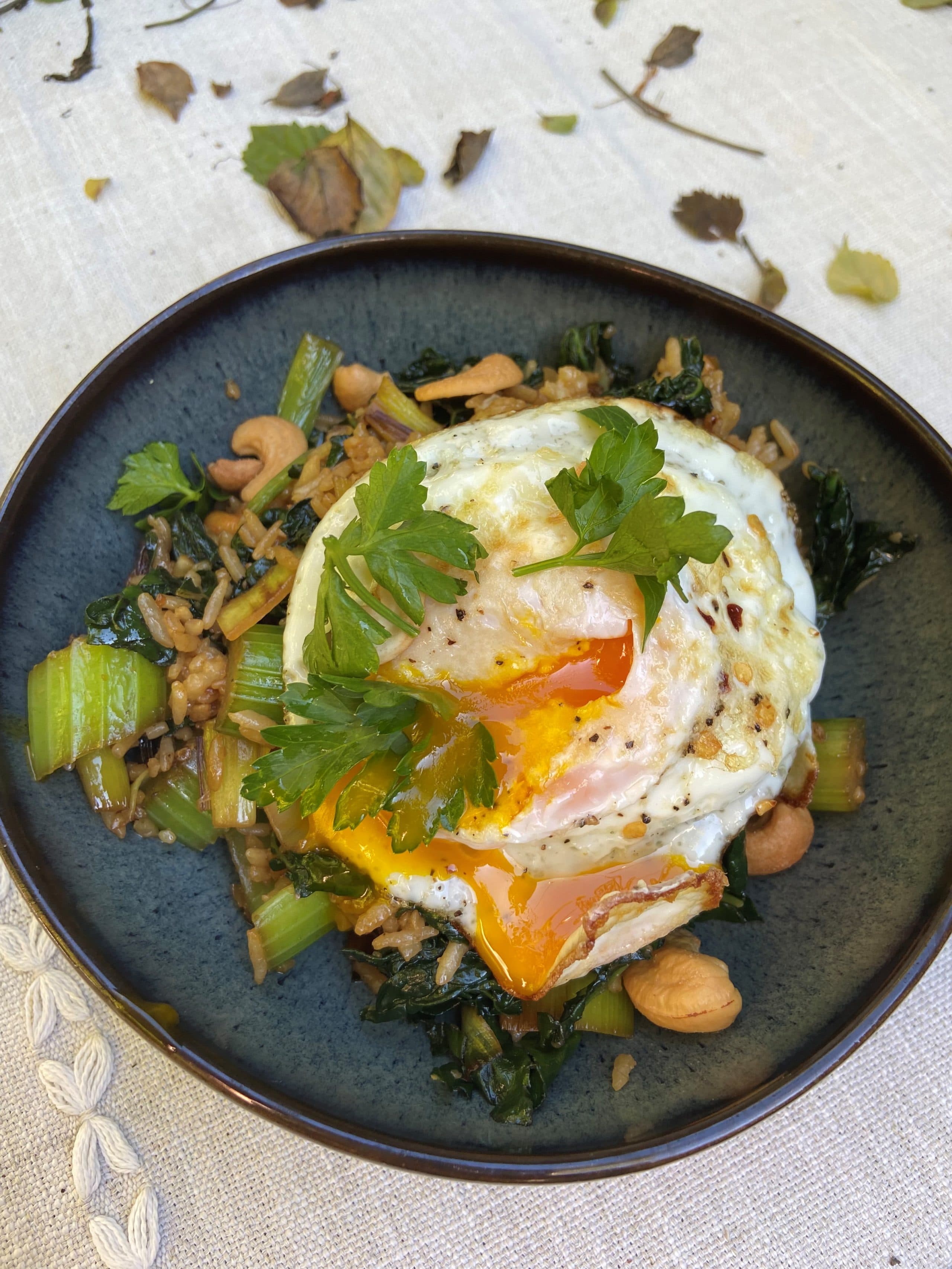 Stir-fried rice with vegetables and fried egg Kathy Gunst/Here & Now)