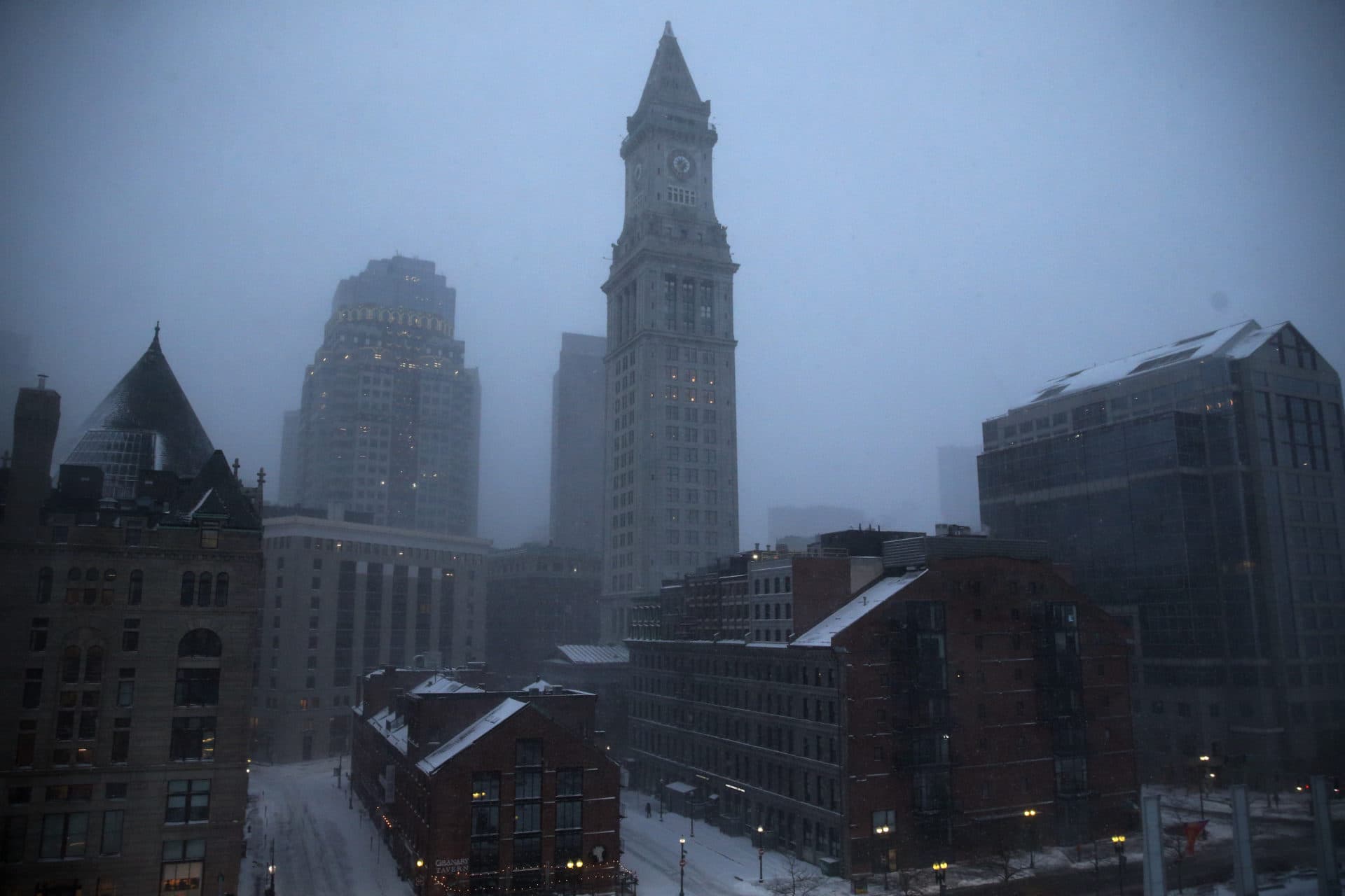 An early morning view during the snowstorm in downtown Boston Saturday. (Craig F. Walker/The Boston Globe via Getty Images)