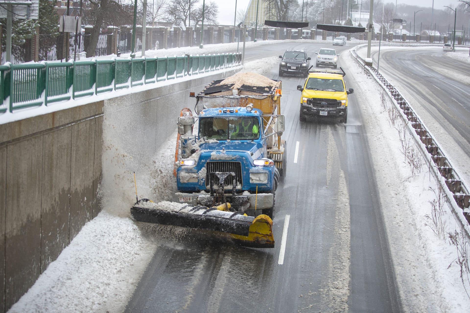 A snowplow clears snow from Storrow Drive. (Robin Lubbock/WBUR)