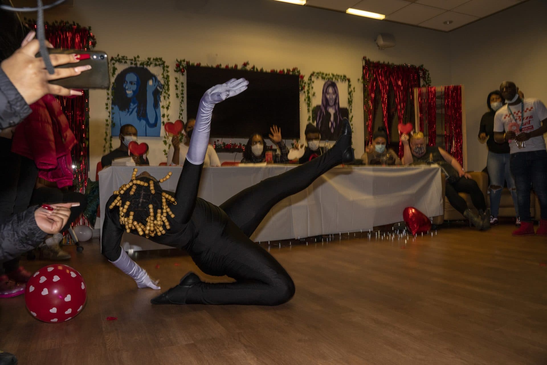 Henny Mulan walks at a ball at Boston GLASS. (OJ Slaughter for WBUR)