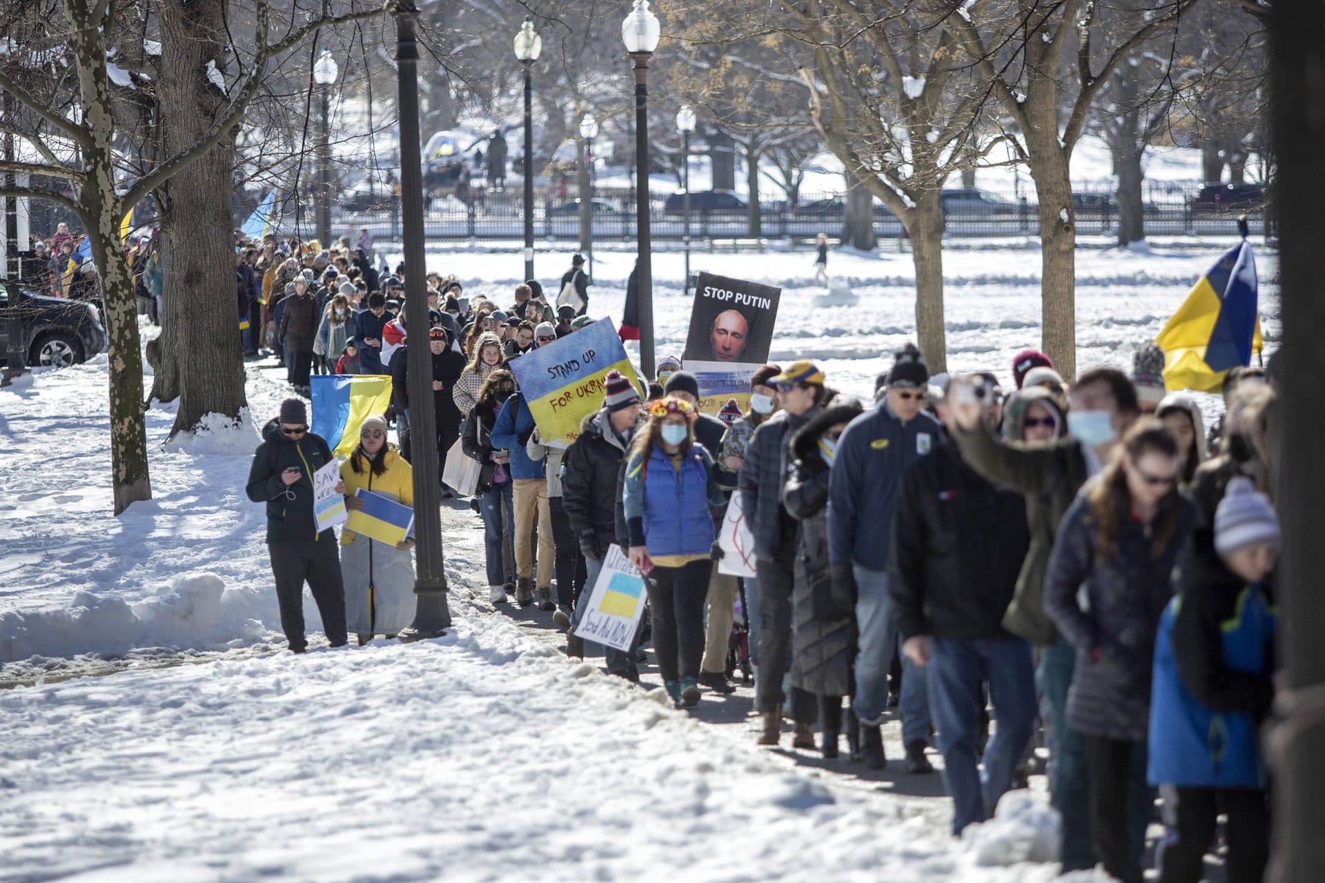 Demonstrators against the war in Ukraine walked from the Boston Public Garden to the State House. (Robin Lubbock/WBUR)