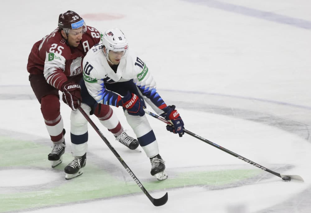 Matty Beniers handles the pick during the Ice Hockey World Championship between United States and Latvia in Riga, Latvia, on May 27, 2021. (Sergei Grits/AP)