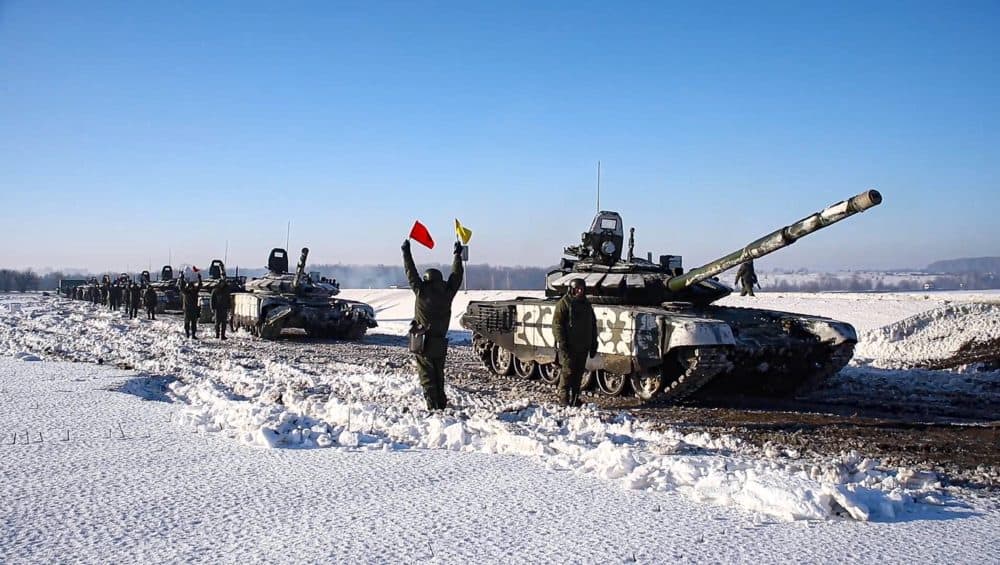 In this photo taken from video provided by the Russian Defense Ministry Press Service on Feb. 15, 2022, Russian army tanks stand ready to move back to their permanent base after drills in Russia. (Russian Defense Ministry Press Service via AP)
