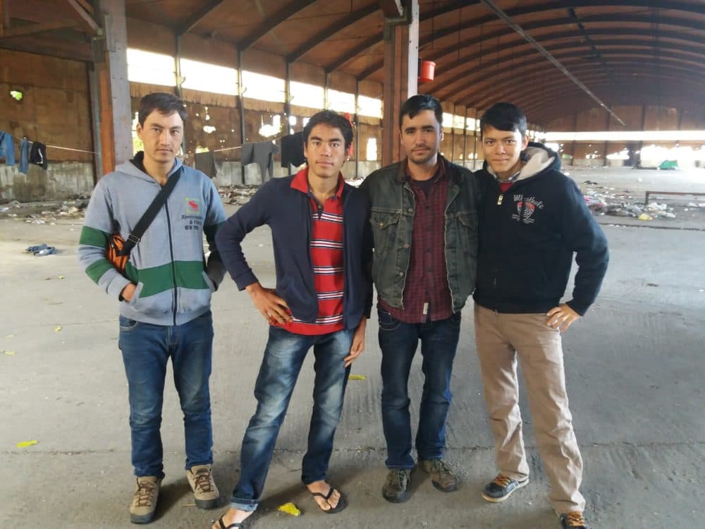 Matthieu Aikins (second from right) with Afghan migrants in Greece. (Courtesy)